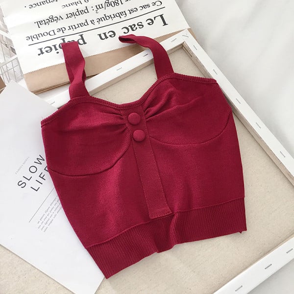 Kötött női felső, vastag pántokkal és gombokkal