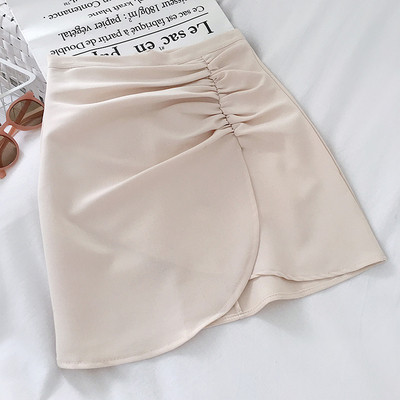 Aszimmetrikus női szoknya magas derékkal, szegélyezett résszel