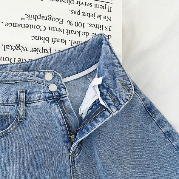 Széles női farmer magas derékkal és övvel