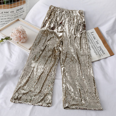 Aktuális női széles modell nadrág magas derékkal és flitterekkel