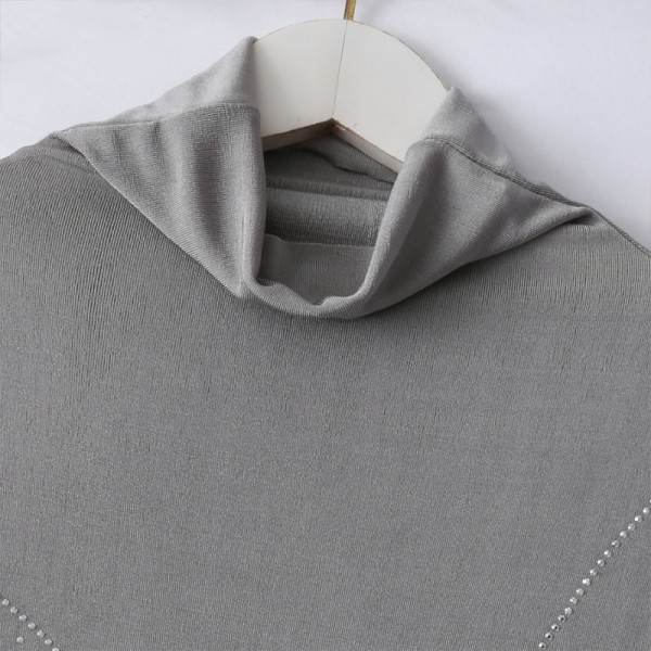 Modern női blúz pólógallérral, hosszú ujjal és rátéttel