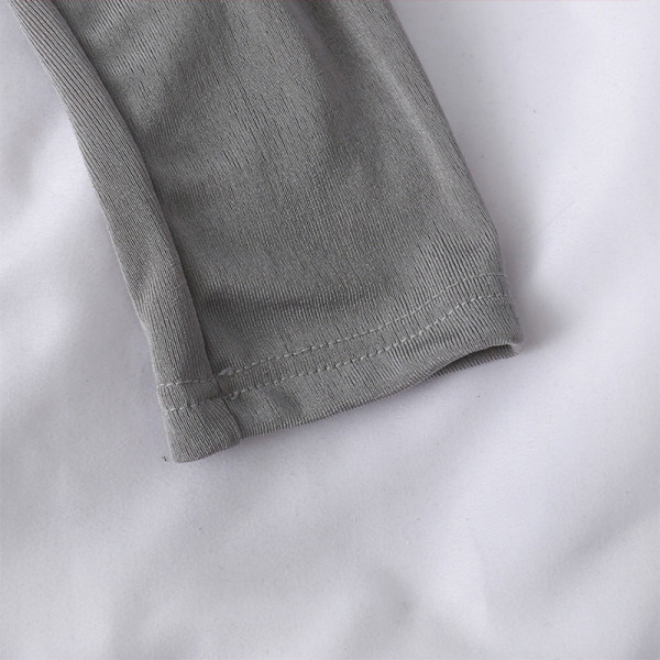 Modern női blúz pólógallérral, hosszú ujjal és rátéttel