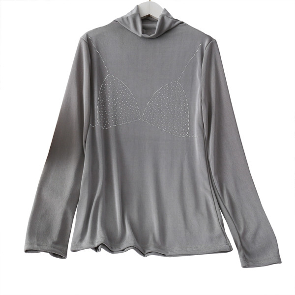 Modern női blúz pólógallérral, hosszú ujjal és rátéttel