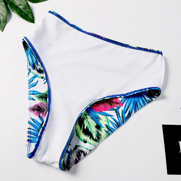 Sieviešu divdaļīgs peldkostīms ar ziedu rakstu un lentes augšdaļu