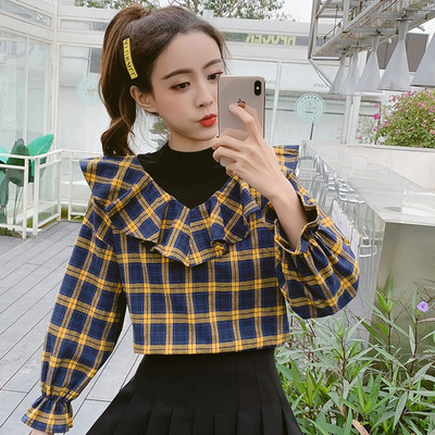 Stílusos női kockás ing fürtökkel és hosszú ujjakkal