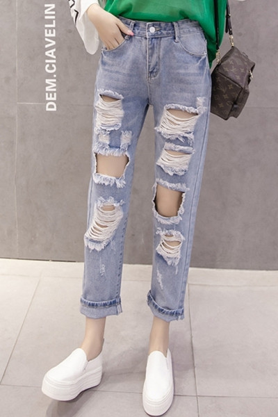 Нов модел дамски дънки със скъсани мотиви и висока талия