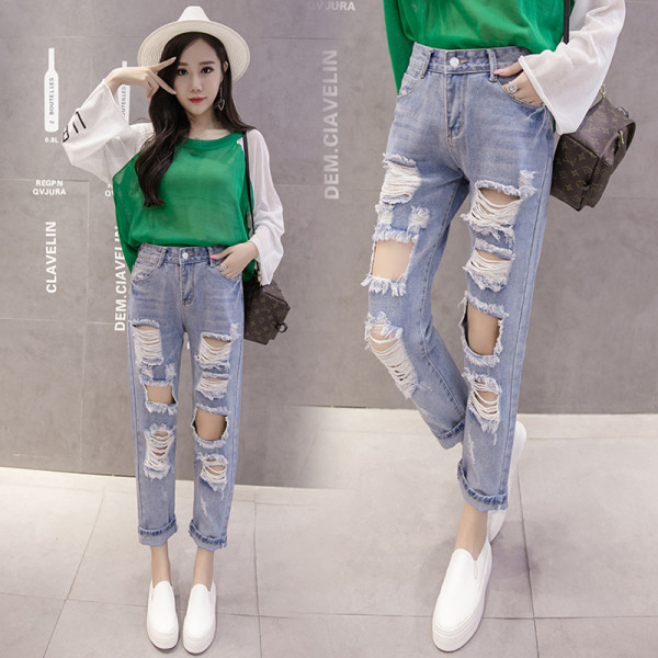 Нов модел дамски дънки със скъсани мотиви и висока талия