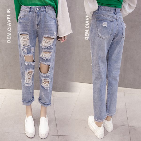 Нов модел дамски дънки със скъсани мотиви и висока талия