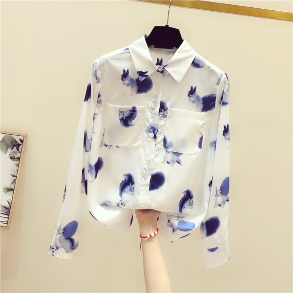 Sieviešu krekls ar krāsainu aplikāciju, kabatām un klasisku apkakli