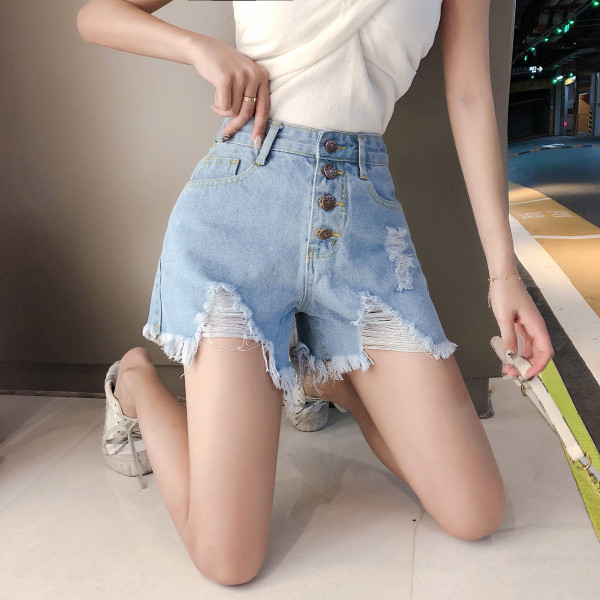 Trumpi moteriški džinsai su plėšytais motyvais ir aukštu juosmeniu