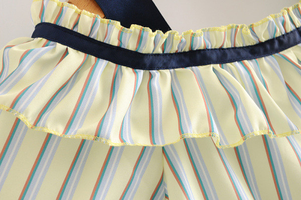 Bluza dama in dungi scurte model asimetric cu bucle