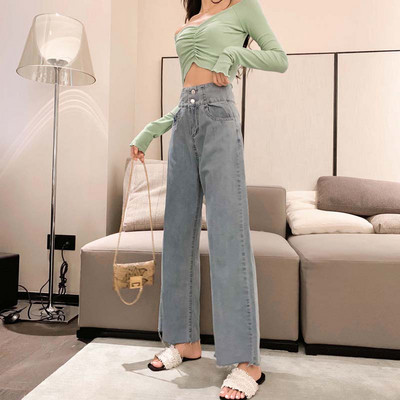 Moteriški džinsai aukštu juosmeniu ir kišenėmis – tiesaus modelio