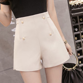 Sieviešu šorti ar metāla elementu un augstu vidukli