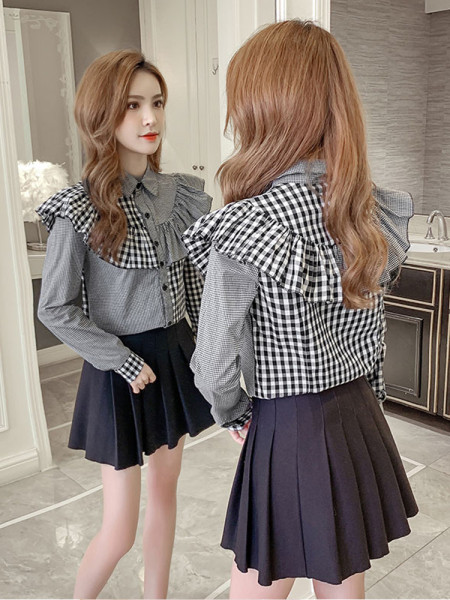 Uue mudeli ruuduline naiste särk nööpide ja lokkidega