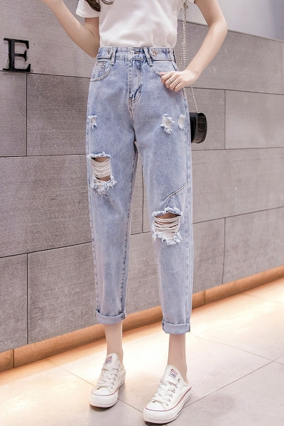 Sieviešu ikdienas džinsi ar augstu vidukli un saplēstiem motīviem zilā krāsā