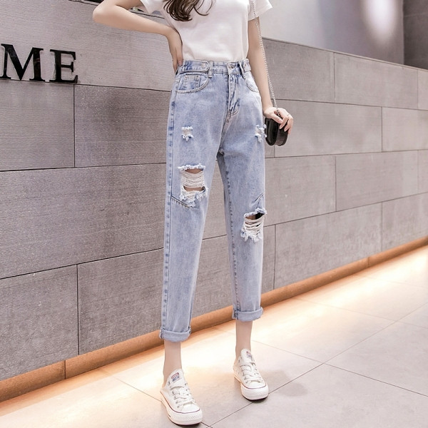 Sieviešu ikdienas džinsi ar augstu vidukli un saplēstiem motīviem zilā krāsā