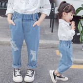 Bērnu džinsi ar kabatām un saplēstiem motīviem meitenēm