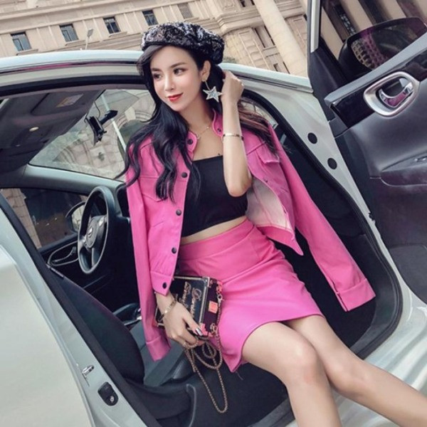 Дамски комплект от кожена пола с висока талия и яке с копчета 