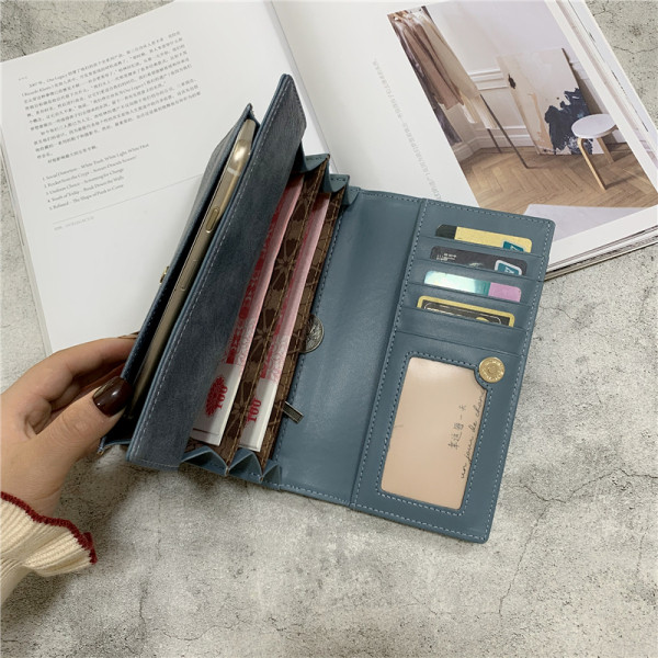 Eko bőrből készült női pénztárca fém rögzítéssel