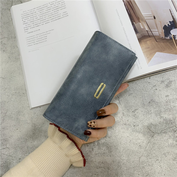 Eko bőrből készült női pénztárca fém rögzítéssel