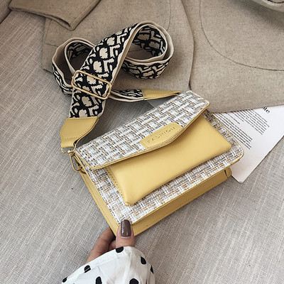 Moderna sieviešu soma ar metāla aizdari un regulējamu rokturi