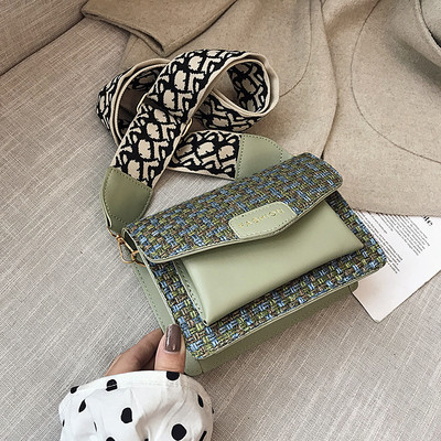 Moderna sieviešu soma ar metāla aizdari un regulējamu rokturi