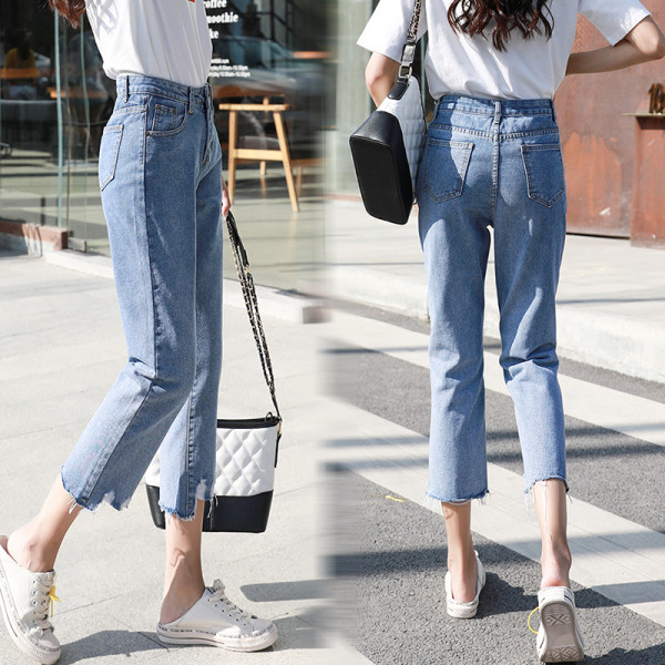 Alkalmi női farmer magas derékkal, jobbra szakadt kék színben