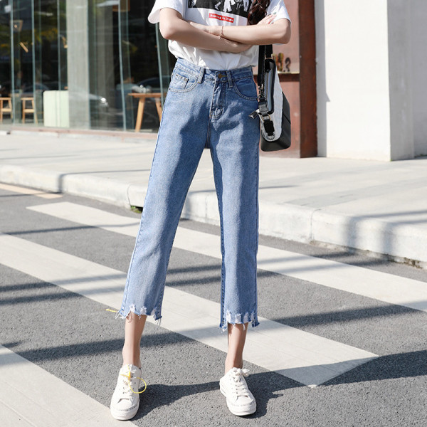Alkalmi női farmer magas derékkal, jobbra szakadt kék színben