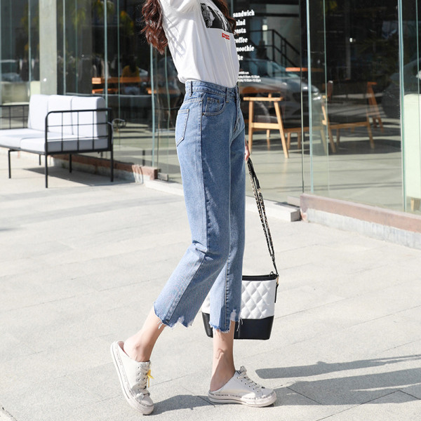 Alkalmi női farmer magas derékkal, jobbra szakadt kék színben