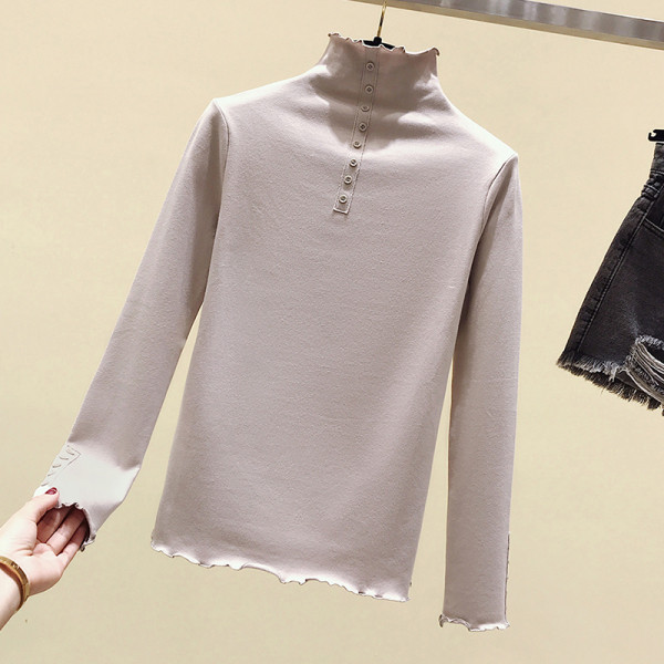 Moteriška rudens-žiemos palaidinė aukšta apykakle ir sagomis ant rankovių