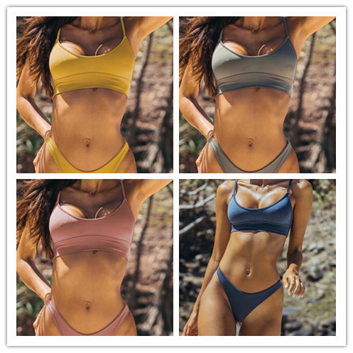 Sieviešu divdaļīgs peldkostīms ar krusteniskām saitēm mugurā