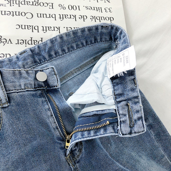 Ikdienas sieviešu džinsi ar augstu vidukli un izšuvumu