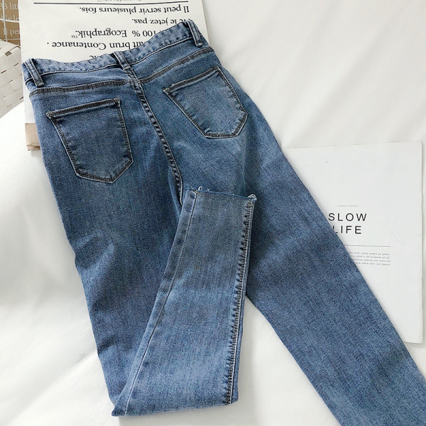 Ikdienas sieviešu džinsi ar augstu vidukli un izšuvumu