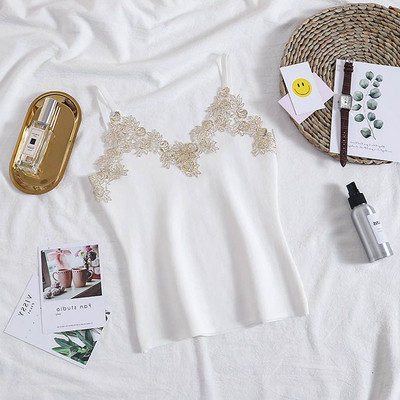 Sieviešu bikses ar V veida kakla izgriezumu un mežģīņu elementiem