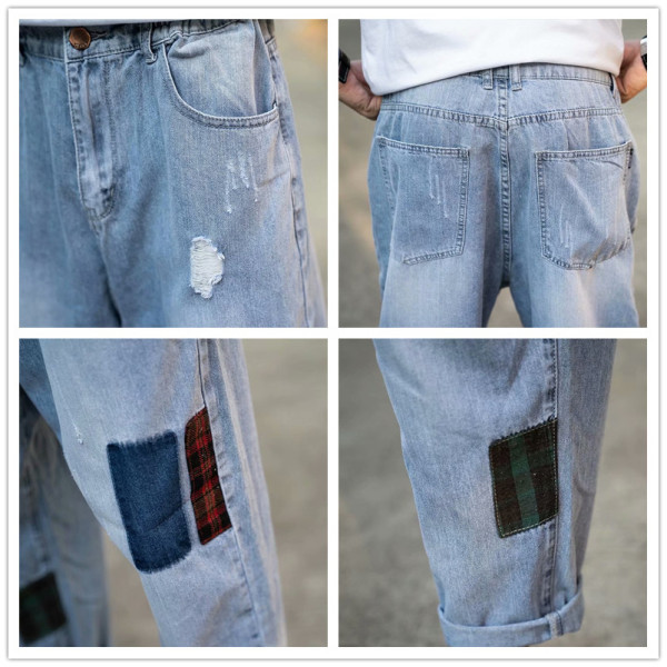 Modernus vyriškų džinsų platus modelis su suplyšusiais motyvais ir lopais