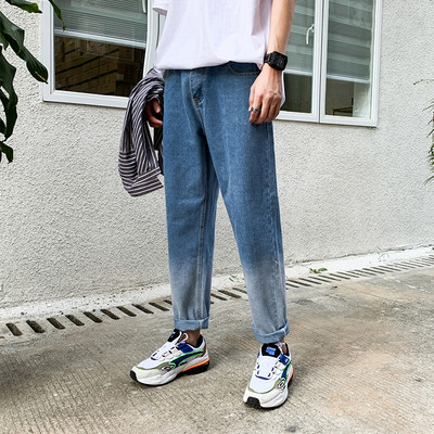 Pašreizējais vīriešu džinsu taisns modelis zaigojošās krāsās