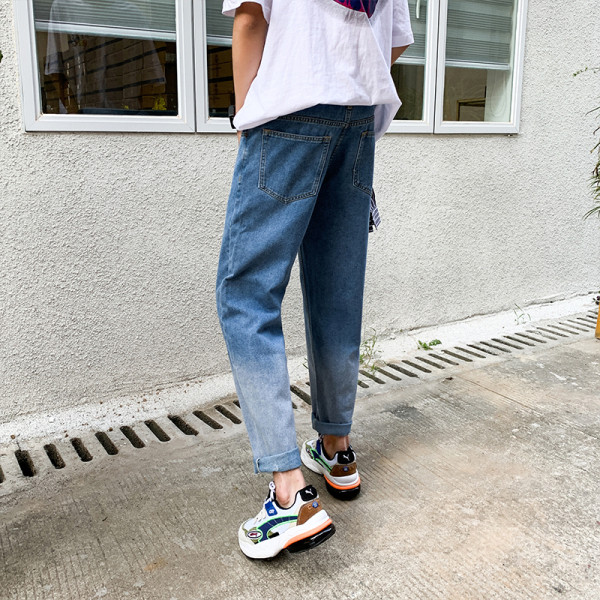 Pašreizējais vīriešu džinsu taisns modelis zaigojošās krāsās