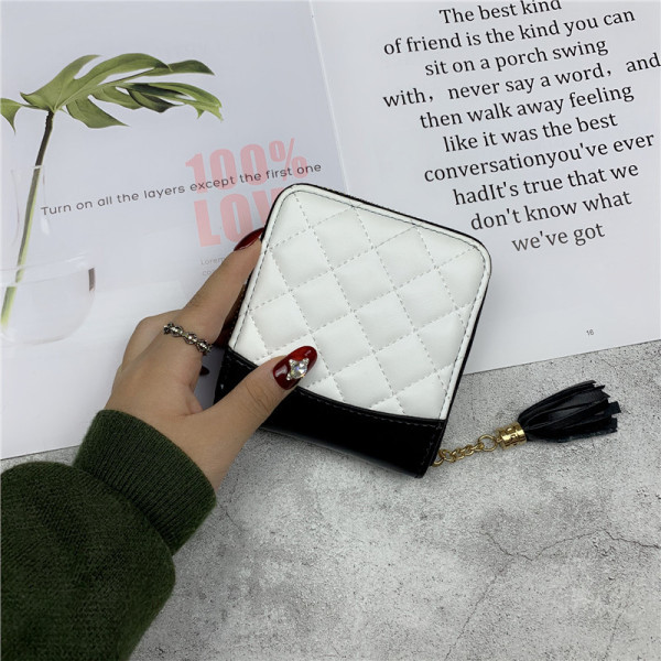 Väike nahast naiste rahakott luku ja tutiga