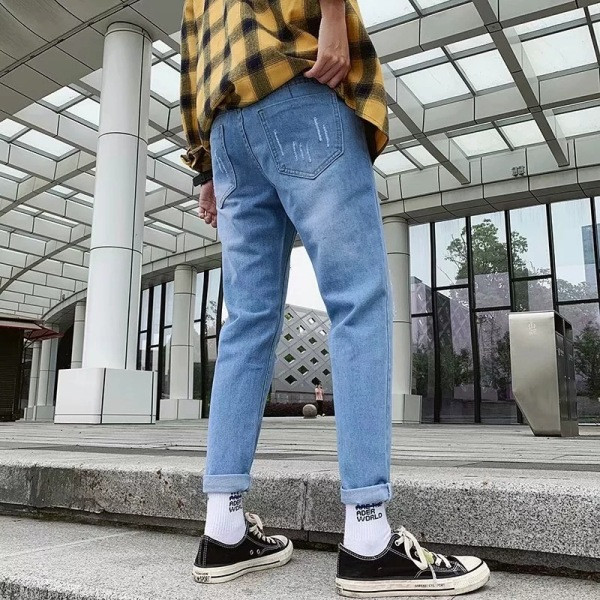 Uus mudel vabaaja meeste teksapüksid heledas värvitoonis rebenenud motiividega