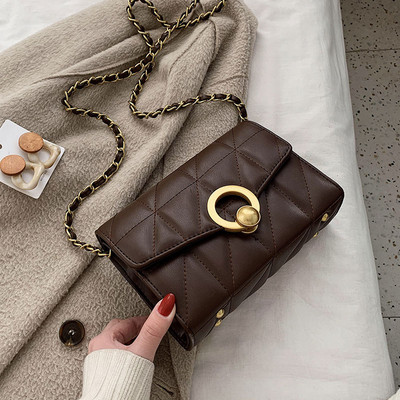 Μοντέρνα έκο δερμάτινη τσάντα  με μεταλλική στερέωση