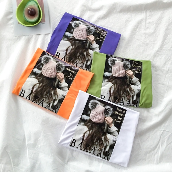 Sieviešu t-krekls ar aplikāciju un apaļu kakla izgriezumu