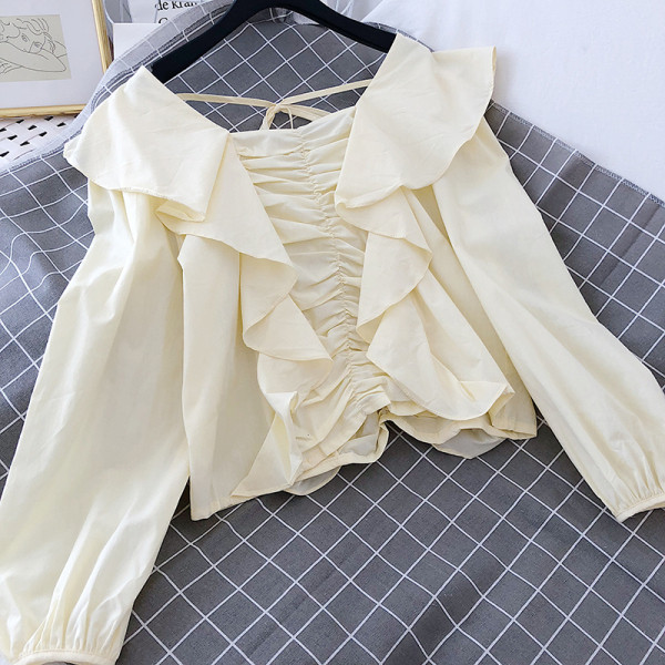 Bluză de damă cu mâneci lungi și bucle