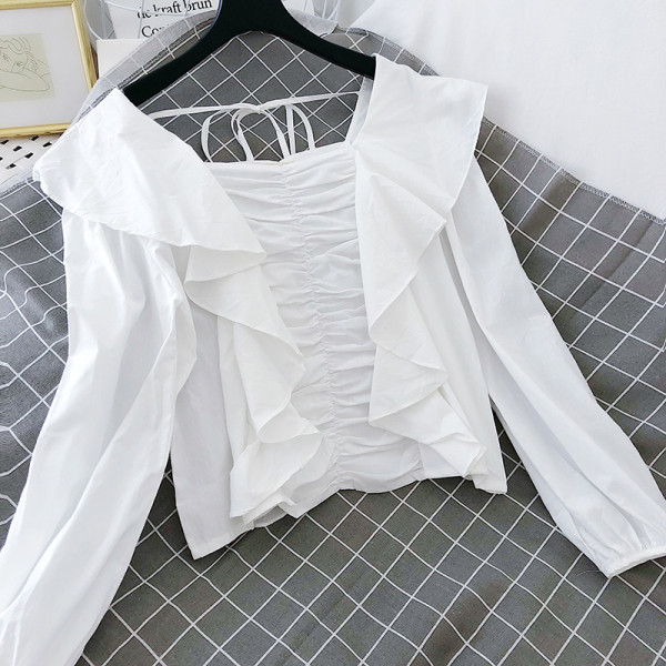 Bluză de damă cu mâneci lungi și bucle