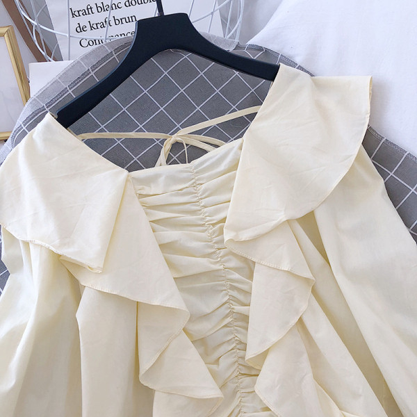 Bluză de damă cu mâneci lungi și bucle