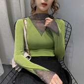 Stiilne naiste pluus ovaalse kaelusega ja kivikestega