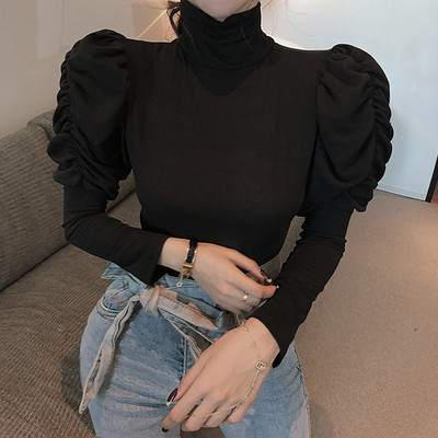 Moodne naiste pluus kõrge krae ja puhvis varrukatega