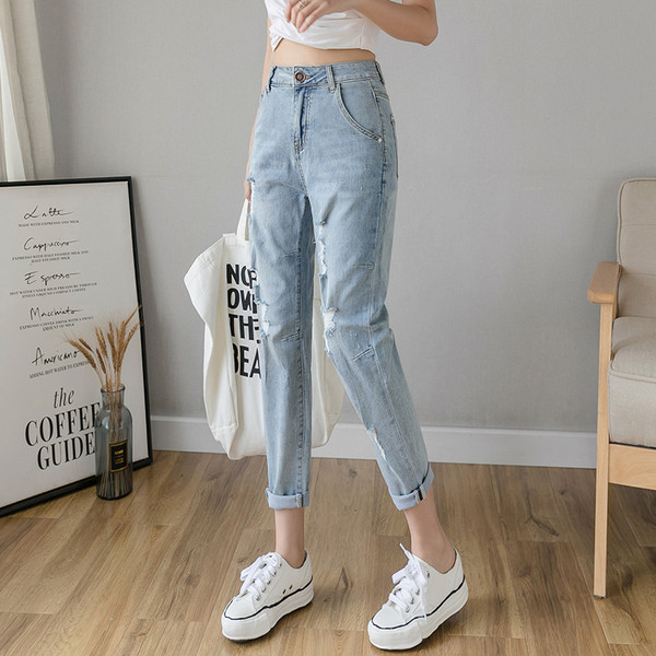 Blugi de dama moderni cu talie inalta si motive rupte - model drept