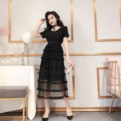 Κομψό γυναικείο φόρεμα με κοντό μανίκι και στρογγυλή λαιμόκοψη