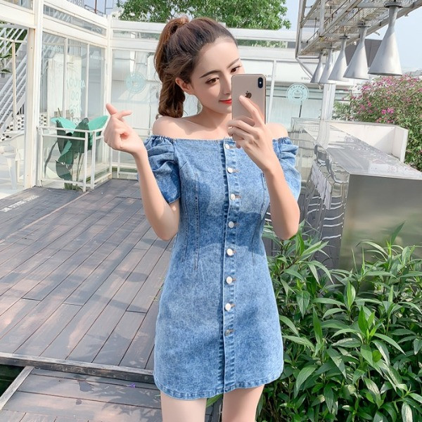 Naiste teksakleit nööpide ja lühikeste varrukatega