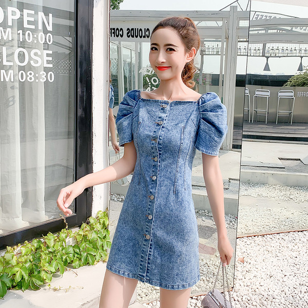 Naiste teksakleit nööpide ja lühikeste varrukatega